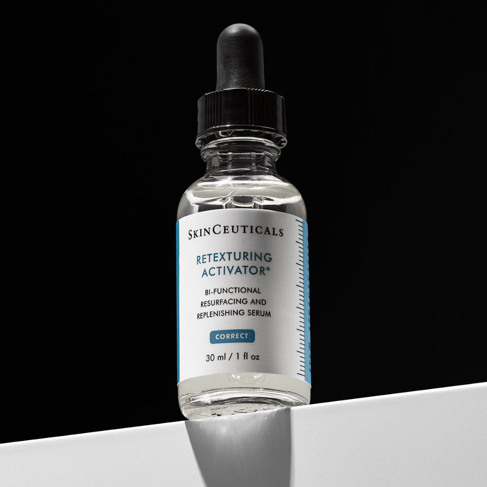 SkinCeuticals Retexturing Activator serum bottle on a black and white background