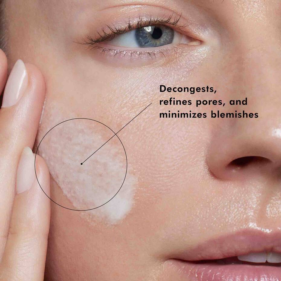 Close-up of a person's face with text indicating skincare benefits of SkinCeuticals LHA Cleanser.
