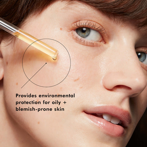 Close-up of a person's face with text about skincare product benefits