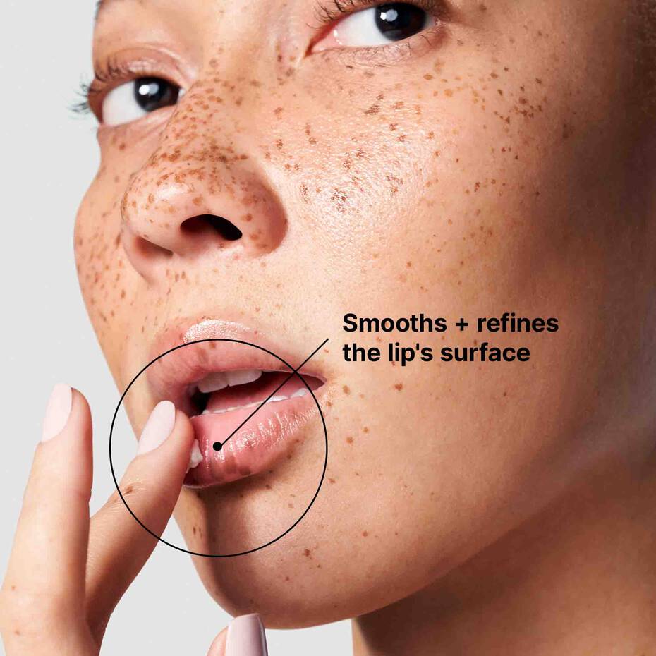 Close-up of a person's face with a focus on the lips, showing text about SkinCeuticals Antioxidant Lip Repair.