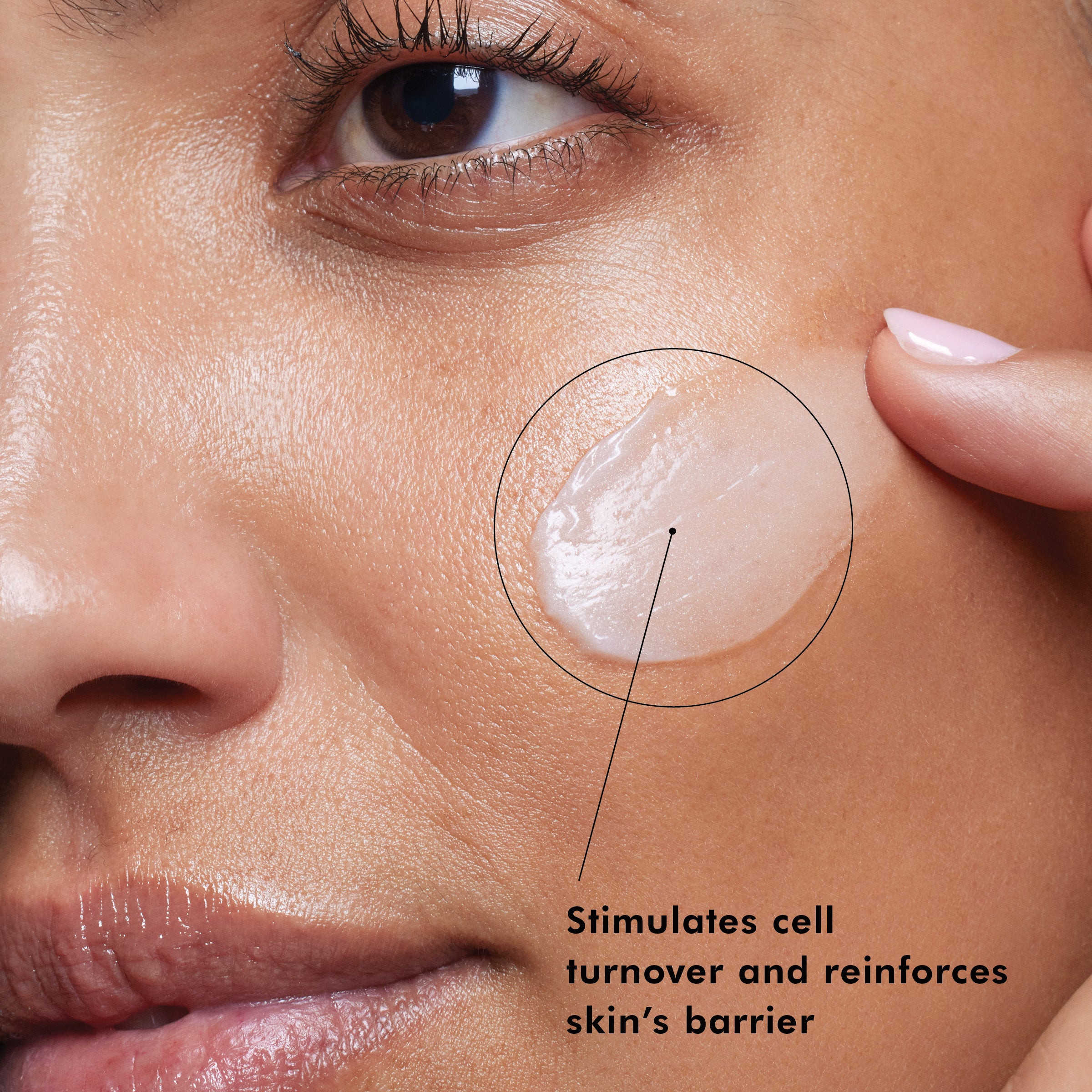 Close-up of a woman's face with a focus on her skin, showing SkinCeuticals Metacell Renewal B3 application.