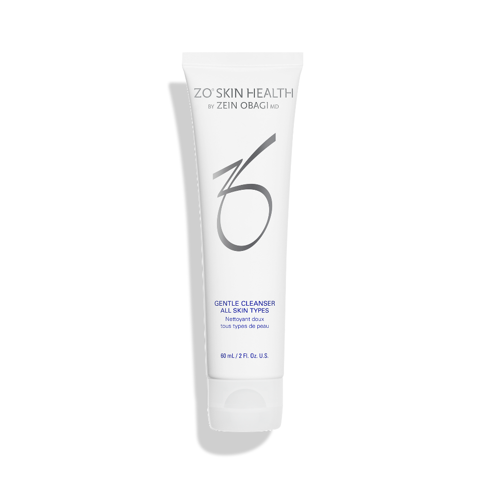 A white squeeze tube of ZO Skin Health Gentle Cleanser All Skin Types, featuring a large stylized '6' logo and blue text, set against a plain white background with a soft shadow.