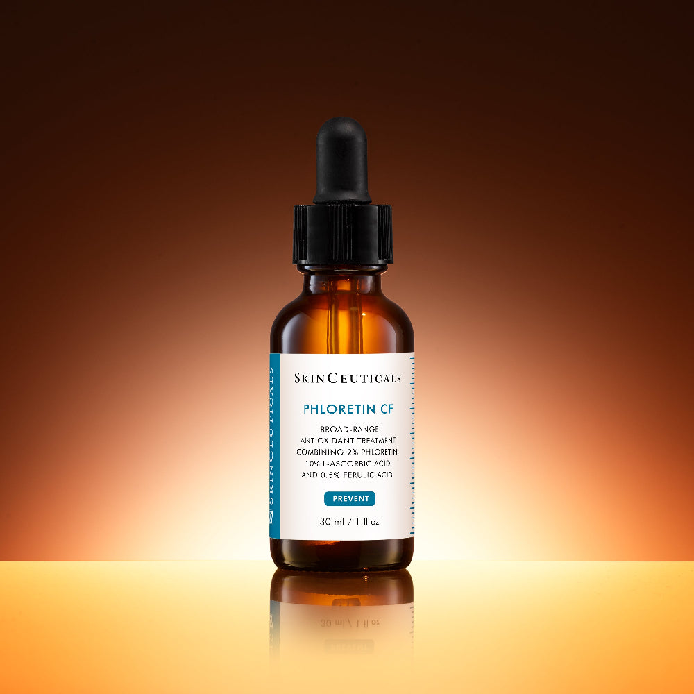 SkinCeuticals Phloretin CF skincare serum bottle with dropper on a gradient background