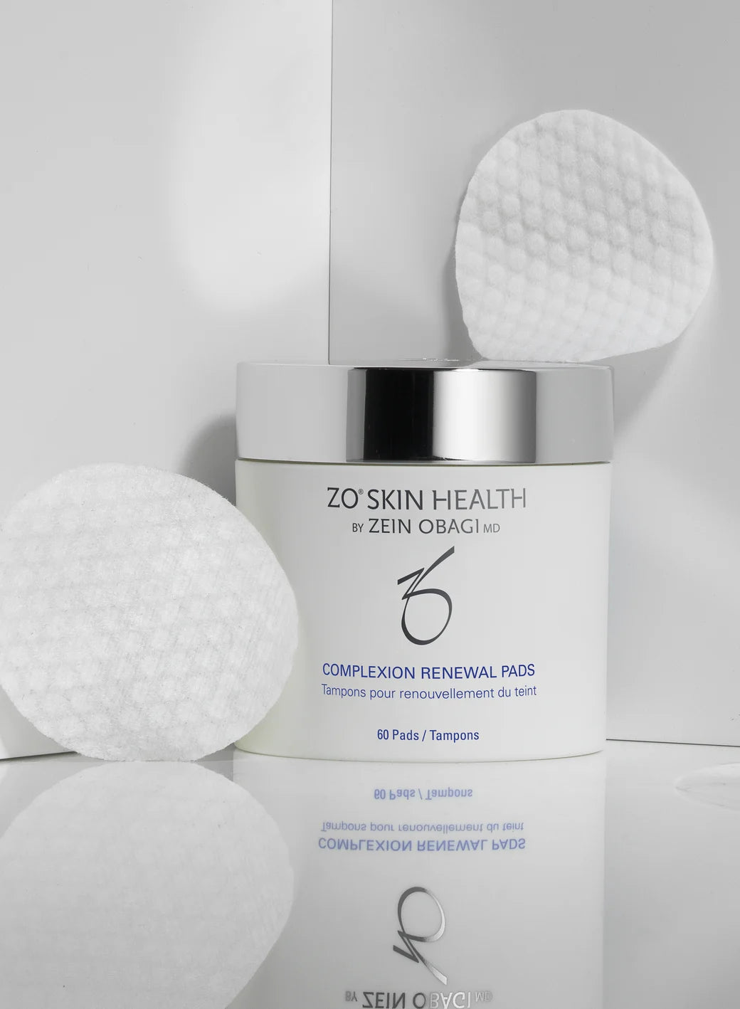 ZO Skin Health Complexion Renewal Pads with applicators on a light gray background