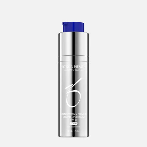 A bottle of ZO Skin Health Sunscreen + Primer Broad-Spectrum SPF 30. The bottle is silver in color with a textured surface.